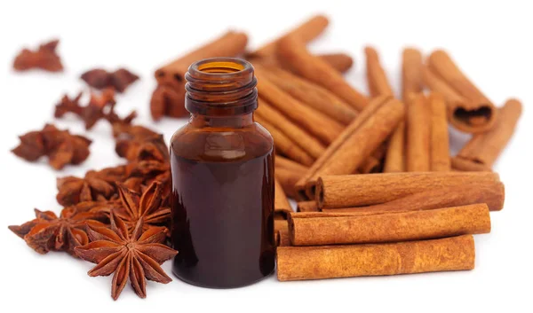 Some aromatic cinnamon with star anise and essential oil — Stock Photo, Image