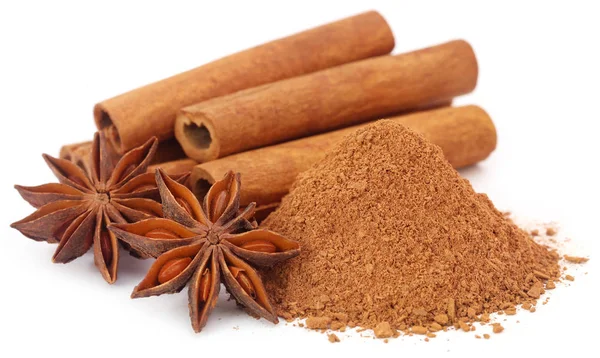 Some aromatic cinnamon with star anise and ground spice — Stock Photo, Image