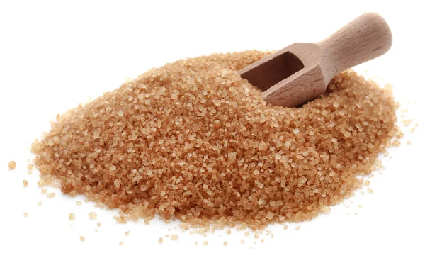 Ahşap kepçe ile kahverengi şeker