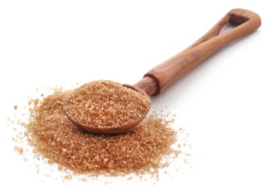 Ahşap kepçe ile kahverengi şeker