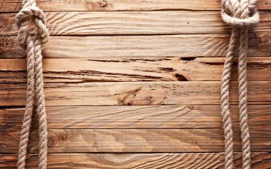 Image of old texture of wooden boards with ship rope. clipart