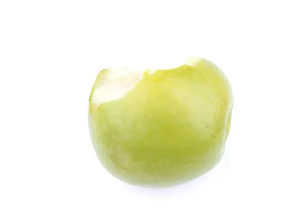 Πράσινο μήλο δαγκωμένο σε λευκό φόντο — Φωτογραφία Αρχείου