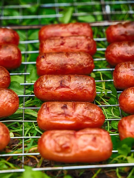 Fried sausages at the stake — Stock Photo, Image