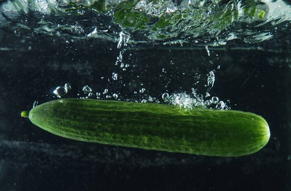 green cucumber in water