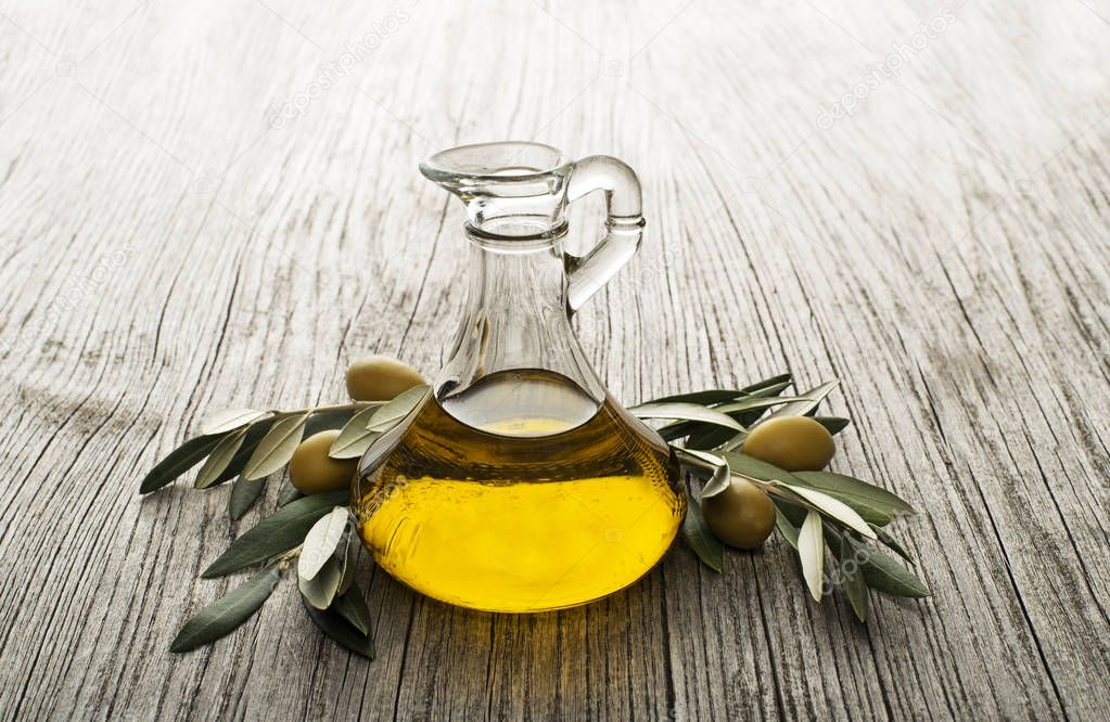 Olive oil background — Stock Photo © photodesign #146577119