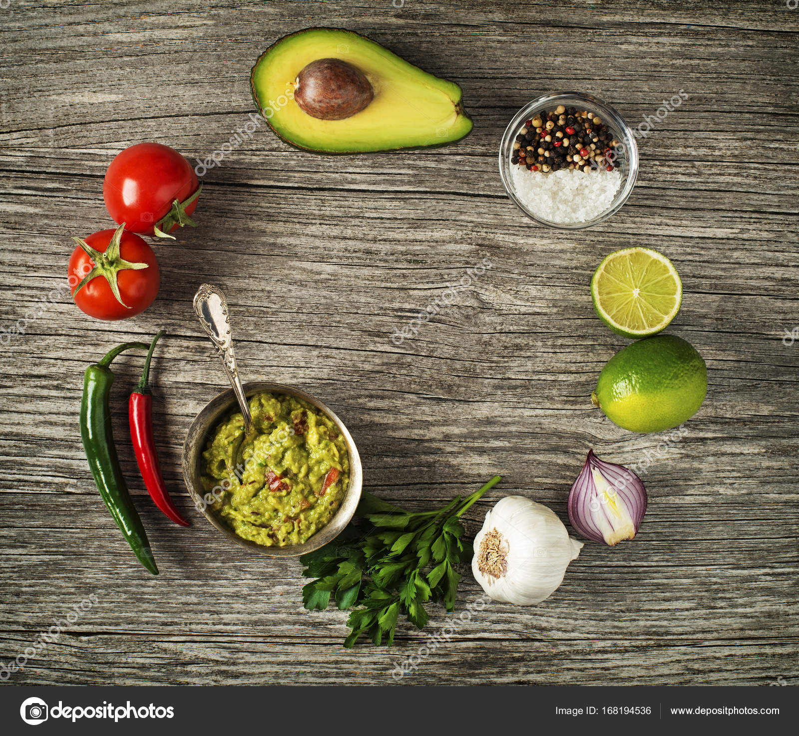 Guacamole with fresh ingredients — Stock Photo © photodesign 168194536