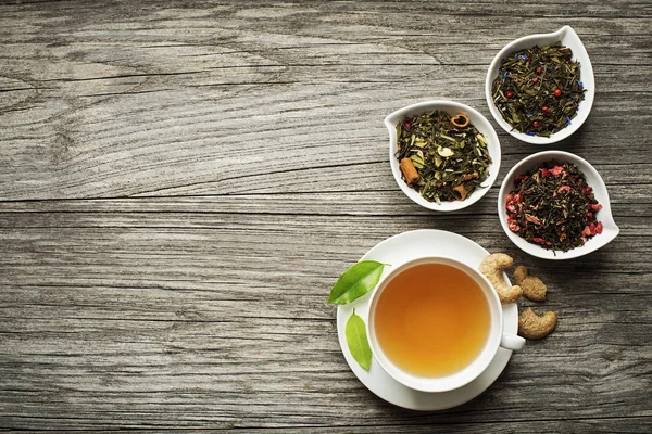 Tea cup with dry teas — Stock Photo, Image