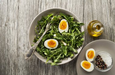 Salad dandelion with eggs clipart