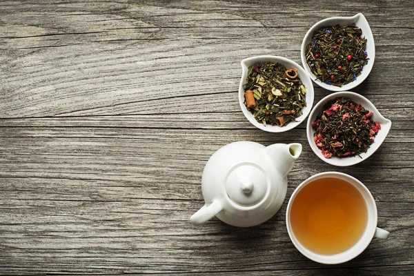 Xícara de chá com coleção de chá — Fotografia de Stock