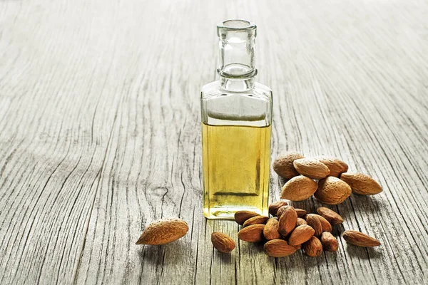 Almond Oil Bottle Wooden Background Close — Stock Photo, Image