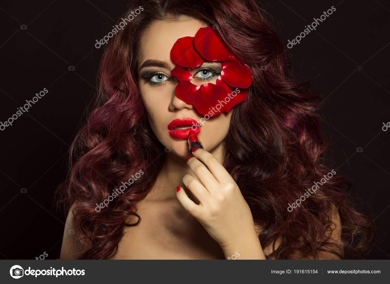 Portrait of beautiful luxury sexy woman with creative makeup and red