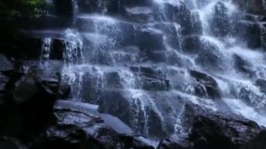 Kanto Lampo waterfall in green rainforest. waterfall in the mountain jungle. Bali,Indonesia. Travel concept.