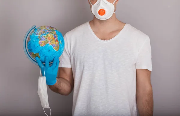 Man Wearing Mask Gloves Holding Globe Covid Concept Isolated White — Stock Photo, Image