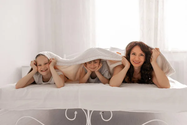 Happy Family Mother Daughter Son Having Fun Home White Bedroom — Stock Photo, Image