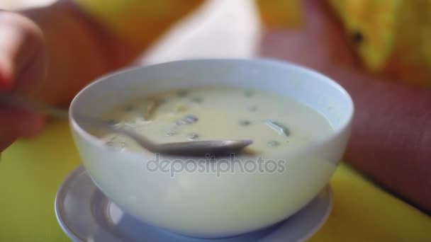 Man eating chicken coconut soup in dish. Closeup. 1920x1080 — Stock Footage Man eating chicken coconut soup in dish. Closeup. 1920x1080 Stock Footage