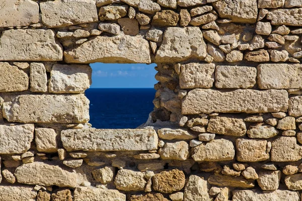 Sky and sea in fortress window — Stock Photo, Image