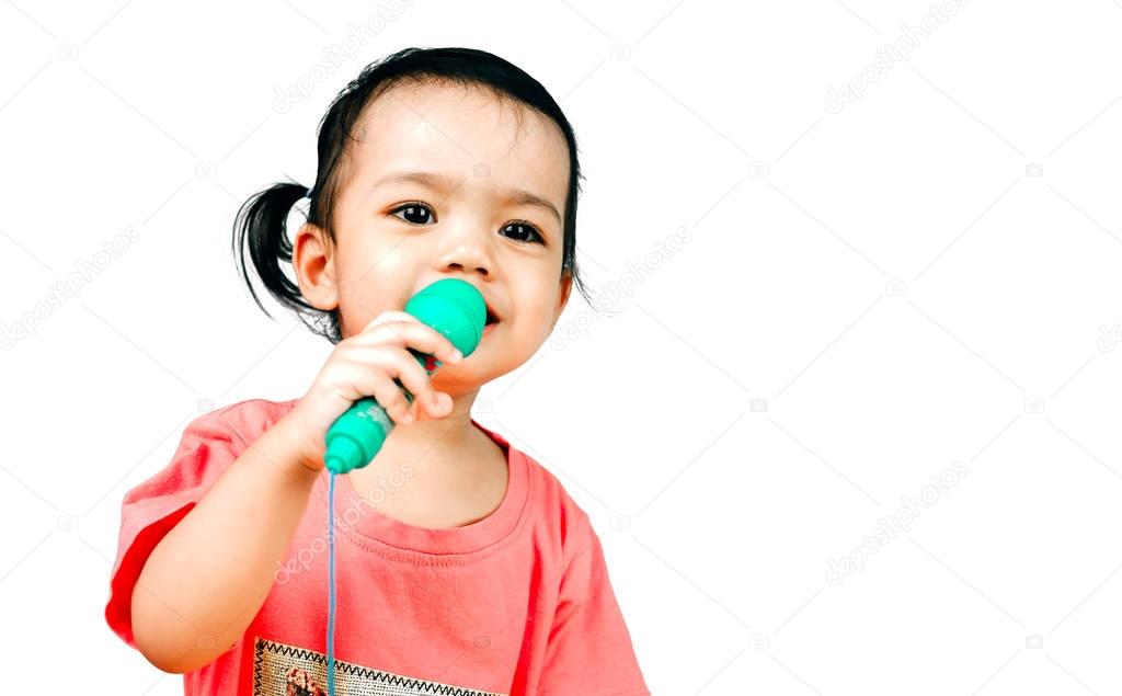 Young girl holding a microphone isolated on the white background