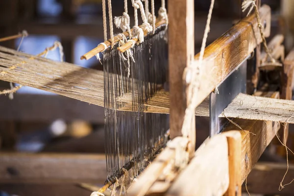 Traditional weaving loom for carpets in Myanmar