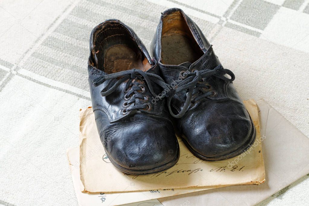 Remembrance of Childhood: Vintage Children's Shoes and Letters