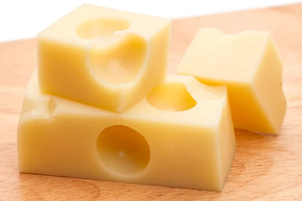 Three slices of Swiss cheese — Stock Photo, Image