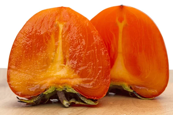 Two halves of persimmon — Stock Photo, Image