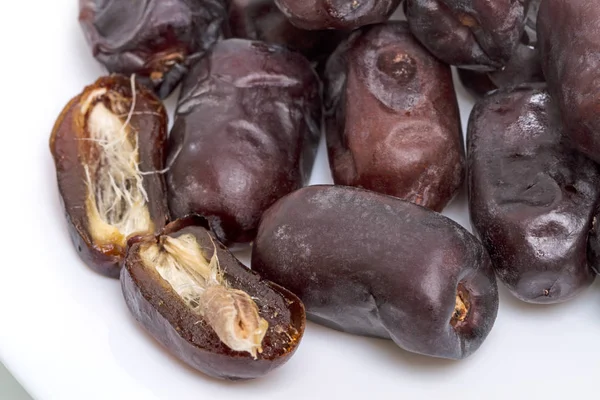 Dates on the plate closeup — Stock Photo, Image