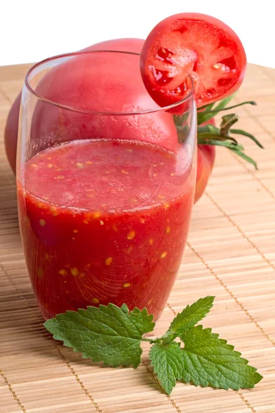 Tomato juice and tomatoes — Stock Photo, Image