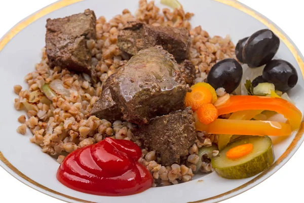 Pieces of liver with garnish — Stock Photo, Image