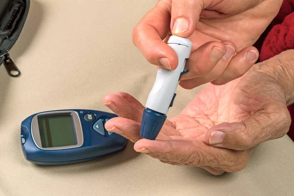 Lancet for glucose control by a medical — Stock Photo, Image