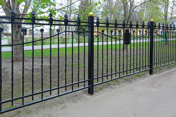 Black metal fence — Stock Photo, Image