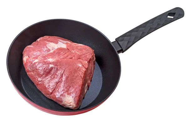 Piece of meat in a frying pan with non-stick coating — Stock Photo, Image