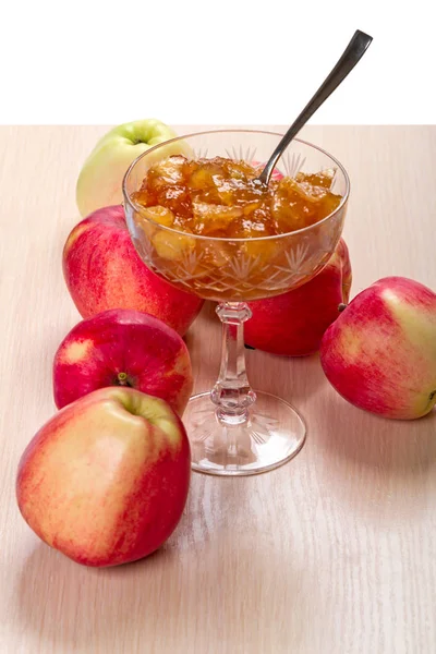 Jam in a vase and apples — Stock Photo, Image