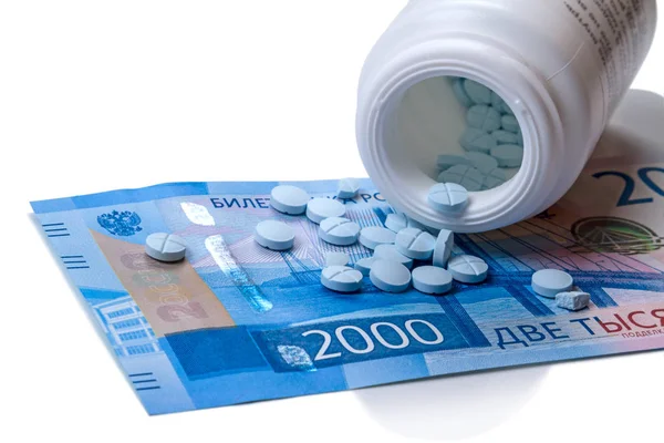 Blue tablets and 2000 rubles — Stock Photo, Image