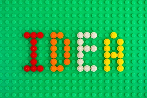 Word idee spell out van Lego ronde stenen — Stockfoto