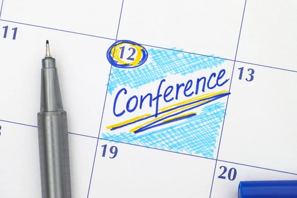 Påminnelse-konferensen i kalendern med penna — Stockfoto