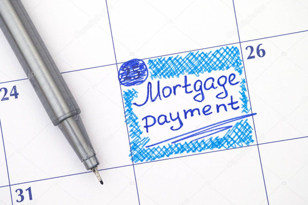 Reminder Mortgage Payment in calendar with pen