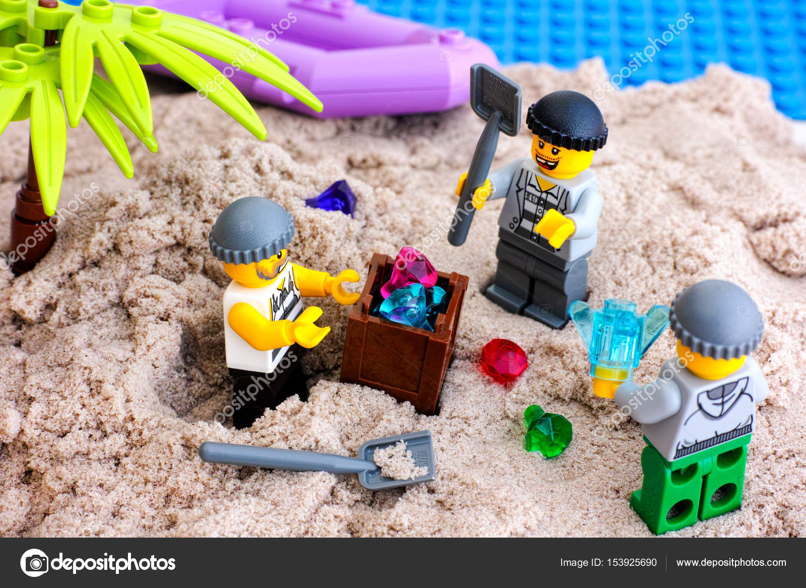 Three digging out box of gems on island – Stock Editorial Photo © Rosinka79 #153925690