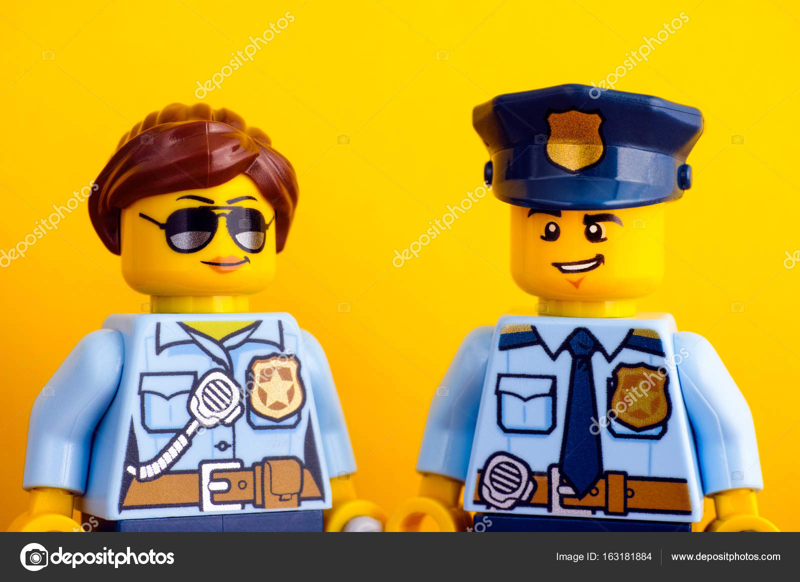 Portrait of Lego policeman and policewoman minifigures on yellow – Stock  Editorial Photo © Rosinka79 #163181884