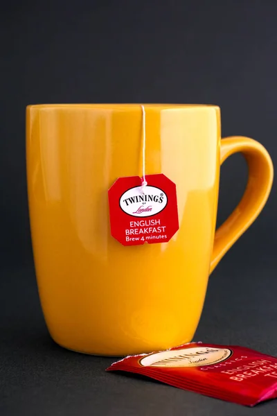 Cup of Twinings English Breakfast tea with teabag. — Stock Photo, Image