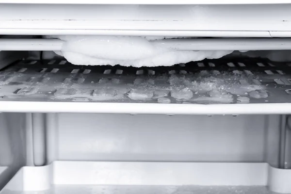Ice in fridge. Close-up.