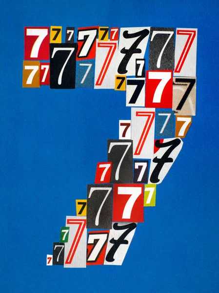 Nummer zeven gemaakt van getallen knipsel uit tijdschriften op blauwe ba — Stockfoto