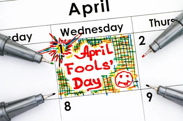 Reminder April Fools Day in calendar with four pens. — Stock Photo, Image