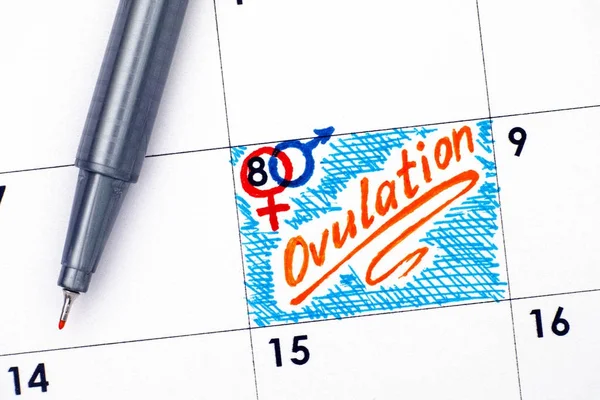 Reminder Ovulation in calendar with orange pen.