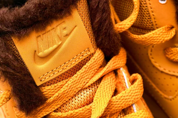 Close-up of label Nike on new winter sport shoes. — Stock Photo, Image