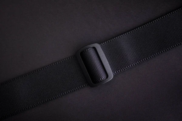Hebilla negra en cinturón negro . —  Fotos de Stock