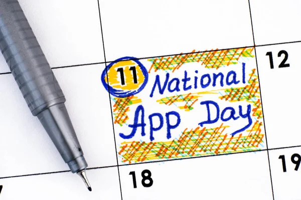 Erinnerung nationaler App-Tag im Kalender mit Stift. — Stockfoto
