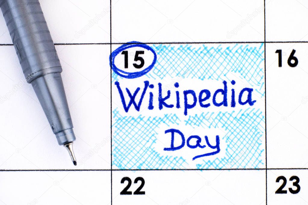 Reminder Wikipedia Day in calendar with pen. 