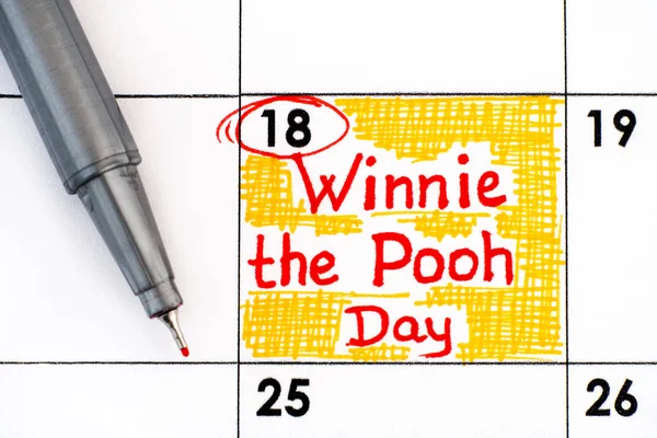 Reminder Winnie the Pooh Day in calendar with pen. — Stock Photo, Image