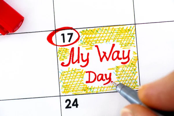 Woman fingers with pen writing reminder My Way Day in calendar — Stock Photo, Image