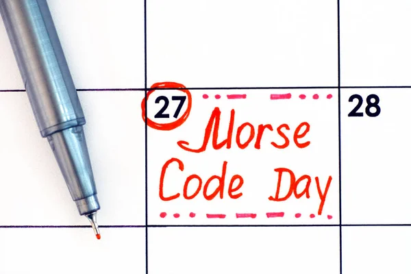 Reminder Morse Code Day in calendar with red pen. April 27.